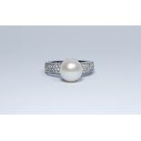 An 18ct white gold,