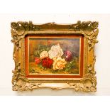 A still life oil painting of roses in a Victorian gilt frame,