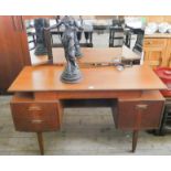 A 1970's Gplan teak kneehole dressing table, 4,