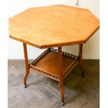 Edwardian light oak two tier occasional table with octagonal top