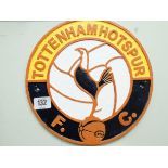 A Tottenham Hot Spurs circular cast iron plaque