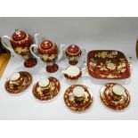 Wedgwood Ruby Tonquin coffee service comprising two coffee pots of graduated sizes,