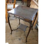 A square Edwardian mahogany occasional table with under tier