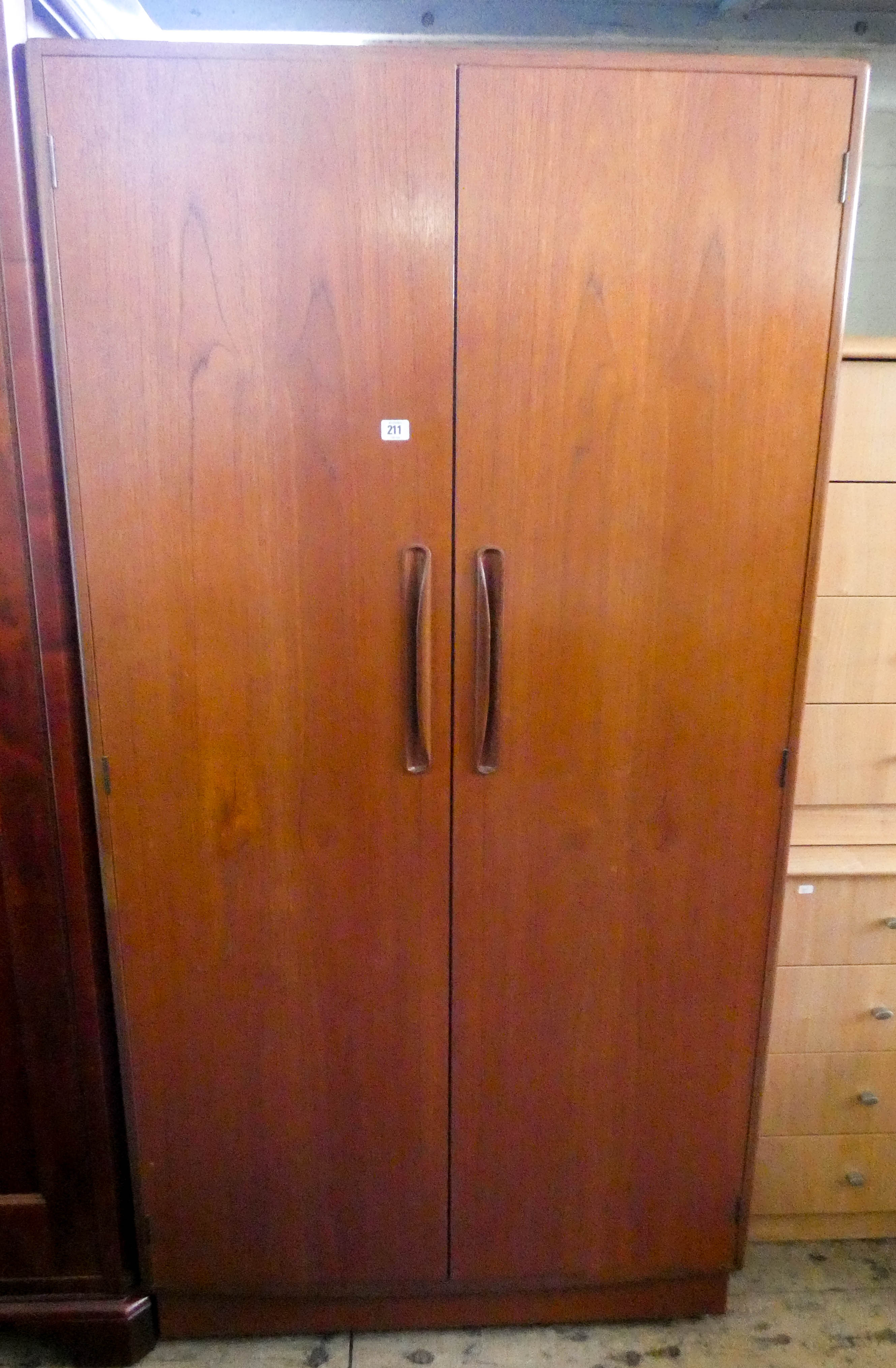 A 1970's Gplan teak semifitted two door wardrobe