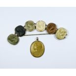 Late 19th century seven panel lava cameo bracelet,