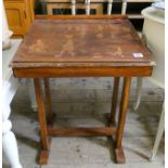 A child's stained school desk