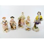 A collection of five porcelain figurines to include Royal Crown Derby 'Flower Seller' by Edward