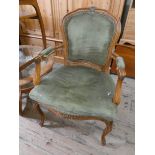 A French style walnut framed green upholstered elbow chair (as found)