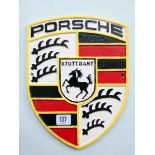 A large Porsche sign