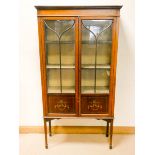 An Edwardian inlaid mahogany and painted decorated, two door china display cabinet,