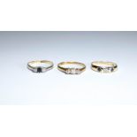 18ct and platinum three stone diamond ring, ring size Q,