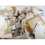 A box of mostly world stamps on and off paper including assorted better items many on miniature