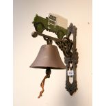 A Land Rover shaped cast iron wall hanging door bell