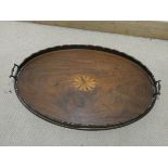 A Georgian oval inlaid mahogany two handled tray with brass handles