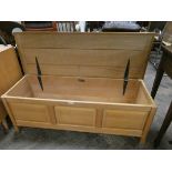 A Reynolds of Ludlow good quality light oak blanket chest or coffer with three panel front,