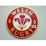 A circular cast iron Wales Rugby plaque