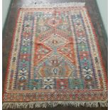 A patterned Oriental rug,