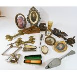 A mahogany box of collectibles to include treen, photography frames, brass door furniture,