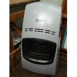 A Delonghi Calor gas heater with partly full gas bottle