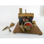 An old brass Steam Engine model 15cms tall