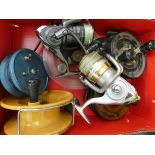 A quantity of centre pin fishing reels and two multiplier fishing reels