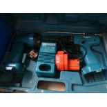 Makita cordless drill, spotlight, two chargers,