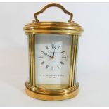 Large good quality oval carriage clock by Matthew Norman, with inscription to Byworth & Company,