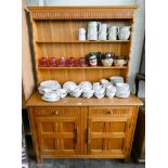 A light oak welsh style dresser with shelf back and drawers and cupboards under,