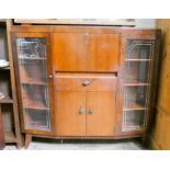 A Walnut park glazed bureau cabinet with drawer and cupboards centre,