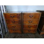 A pair of reproduction yew wood two drawer office filing cabinets