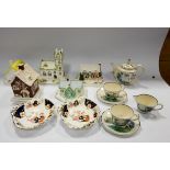 A collection of Coalport, Pastille Burner style cottages,