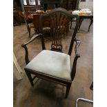 A Georgian style mahogany elbow chair with a blue upholstered seat