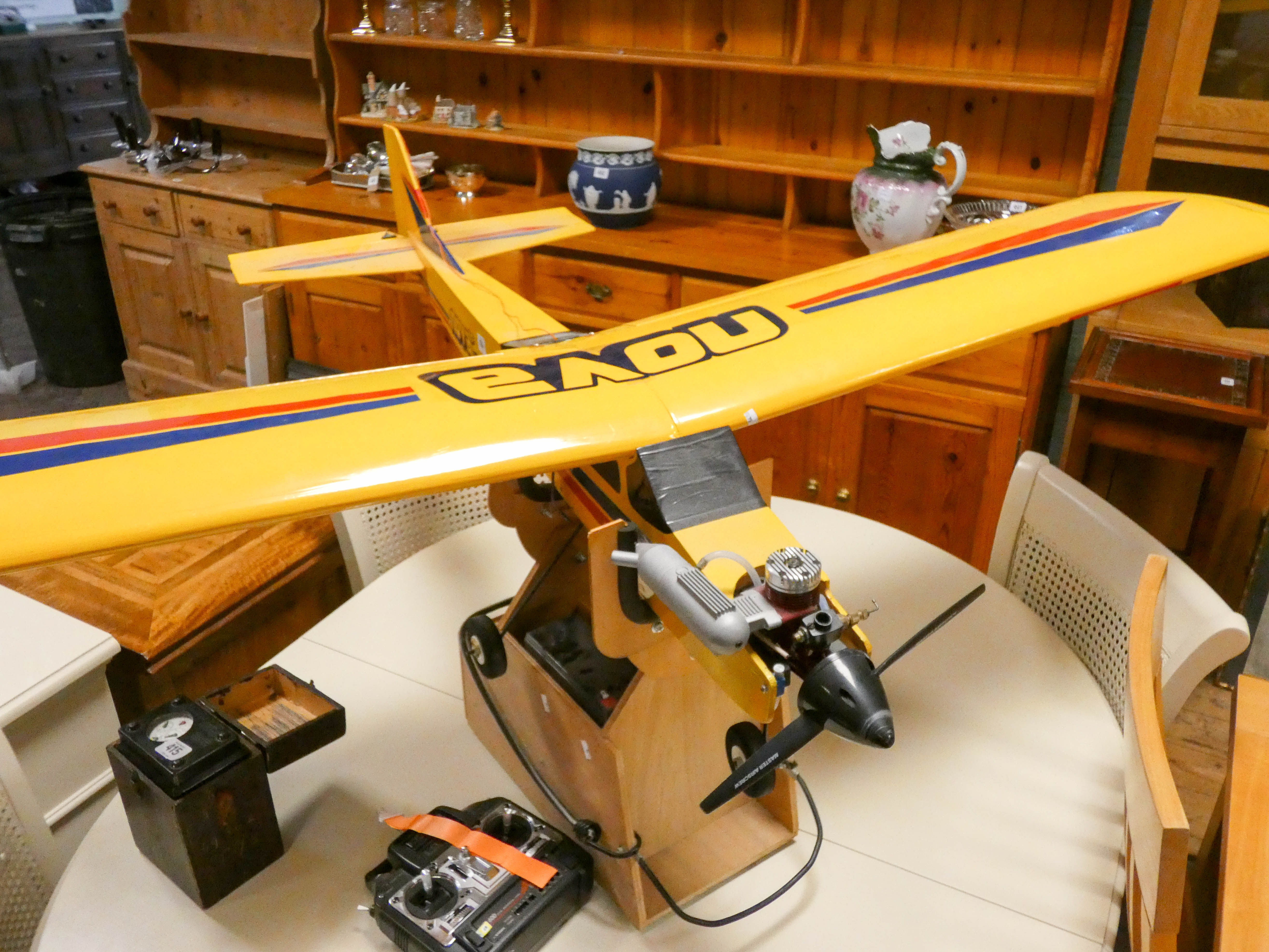 A large model airplane complete with jetex style engine with remote control unit and other spare - Image 2 of 4