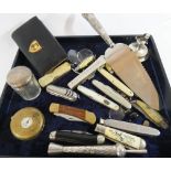 A tray of collectibles to include a silver handled wedding cake knife,