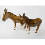 Two Beswick donkeys