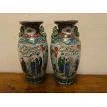 A pair of Chinese figure decorated vases, 14.