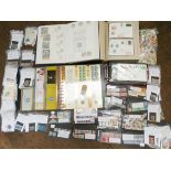 A large assortment of stamps within three albums with some first day covers and bag of loose world