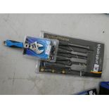 A new four piece chisel set and a new adjustable wrench