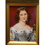A decorative continental porcelain portrait plaque of a young lady in gilt frame 9" x 6 1/2"