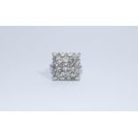 An 18ct diamond cluster ring,