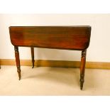 A Victorian mahogany Pembroke table fitted one drawer on turned legs 3' wide