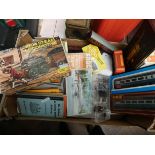 A large box of mostly plastic railway carriages, railway books,