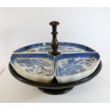 A Waring and Gillow willow pattern hors d'oeuvre dish on oak lazy Susan,