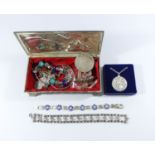 A collection of ladies jewellery to include a silver pendant of St Christopher,
