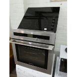 A De Dietrich built in oven in stainless steel case along with a Bosch four ring hob
