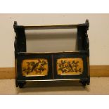 A Victorian ebonised and bird painted two door wall cabinet