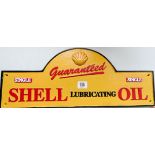 A large Shell lubricating oil sign