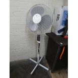 Oscillating fan on an adjustable stand/base