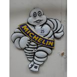 A Michelin cast iron wall hanging plaque