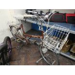 A Shopper Raleigh bicycle with front and rear rack